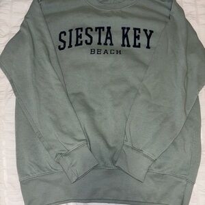 Siesta Key Beach Woman’s Green Crewneck